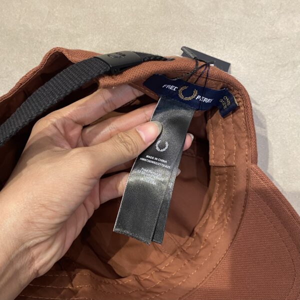 CAPS FRED PERY BROWN